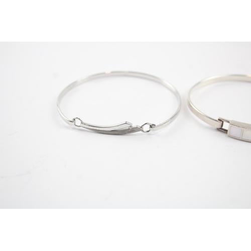 2105 - Four sterling silver gemstone bangles to include diamond, amethyst etc. - approx. gross weight 45g