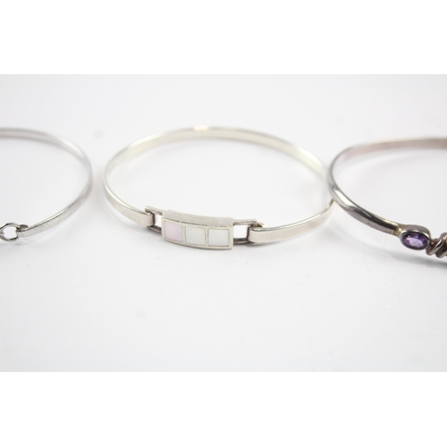 2105 - Four sterling silver gemstone bangles to include diamond, amethyst etc. - approx. gross weight 45g