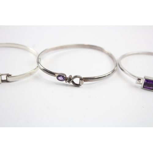 2105 - Four sterling silver gemstone bangles to include diamond, amethyst etc. - approx. gross weight 45g