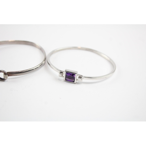 2105 - Four sterling silver gemstone bangles to include diamond, amethyst etc. - approx. gross weight 45g