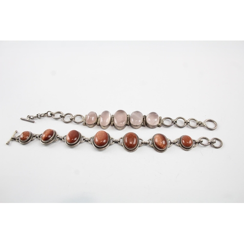 2106 - Two sterling silver gemstone bracelets to include rose quartz etc. - approx. gross weight 59g