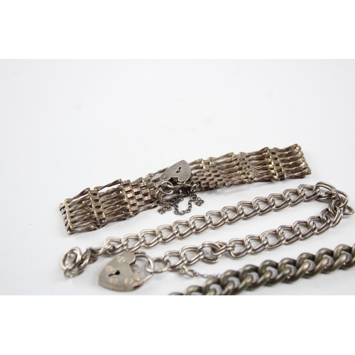 2107 - Three sterling silver gate bracelets with heart padlock clasps - approx. gross weight 52g