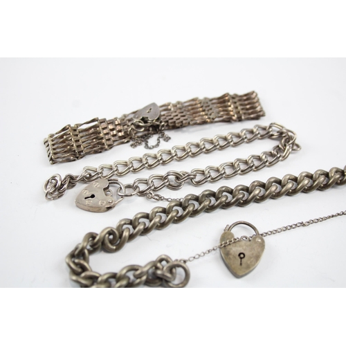 2107 - Three sterling silver gate bracelets with heart padlock clasps - approx. gross weight 52g