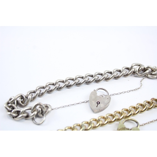 2113 - Three sterling silver gate bracelets with heart padlock clasps - approx. gross weight 68g