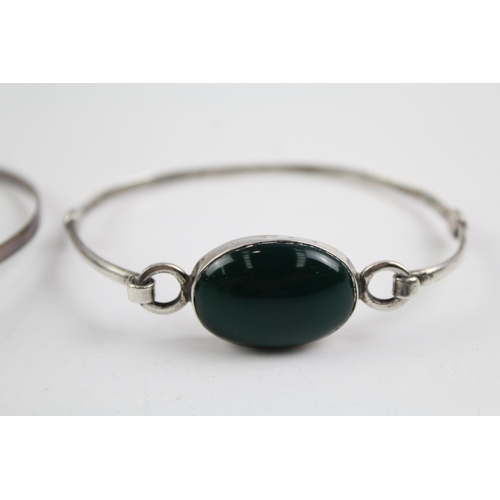 2114 - Three sterling silver gemstone bangles to include moonstone, larimar etc. - approx. gross weight 37g