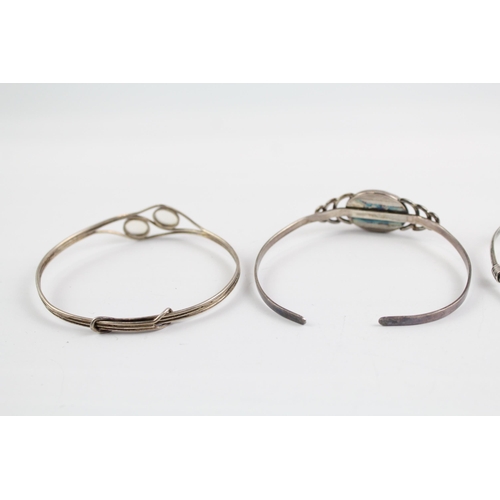 2114 - Three sterling silver gemstone bangles to include moonstone, larimar etc. - approx. gross weight 37g