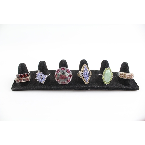 2116 - Seven sterling silver gemstone rings to include tanzanite, garnet etc. - approx. gross weight 42g