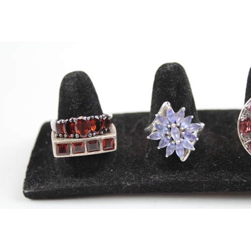 2116 - Seven sterling silver gemstone rings to include tanzanite, garnet etc. - approx. gross weight 42g