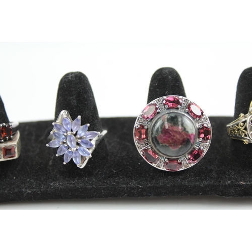 2116 - Seven sterling silver gemstone rings to include tanzanite, garnet etc. - approx. gross weight 42g