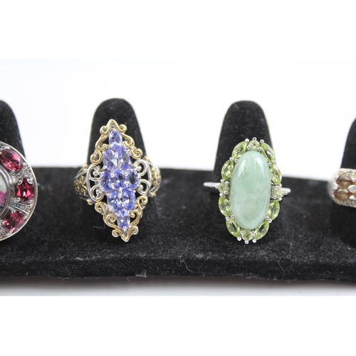 2116 - Seven sterling silver gemstone rings to include tanzanite, garnet etc. - approx. gross weight 42g