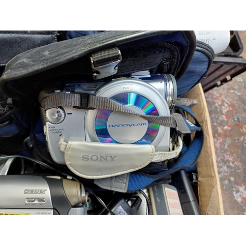 508 - A box containing a very large collection of Sony Handycam camcorders and accessories