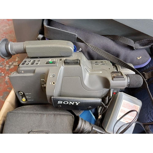 508 - A box containing a very large collection of Sony Handycam camcorders and accessories