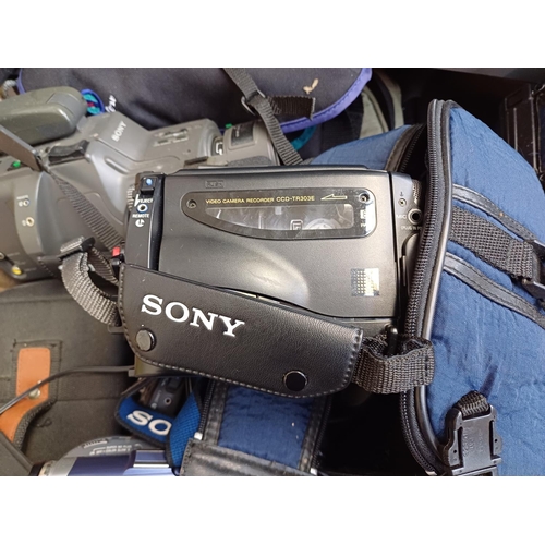 508 - A box containing a very large collection of Sony Handycam camcorders and accessories