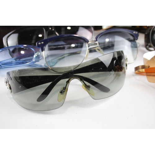 351 - Seven pairs of cased designer sunglasses and glasses