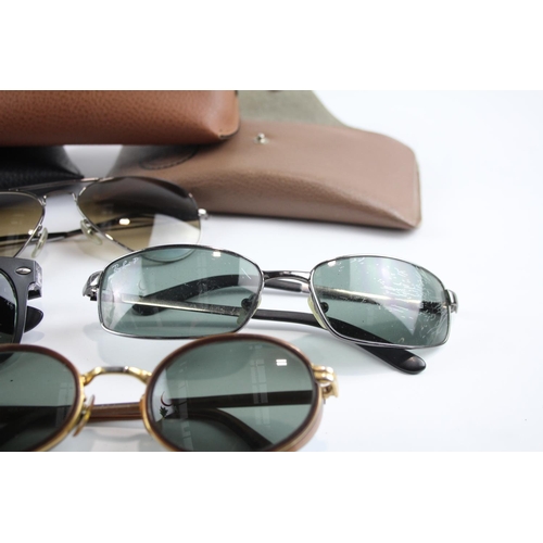 355 - Five pairs of cased Ray-Ban sunglasses