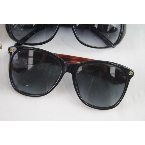 371 - Four pairs of cased designer sunglasses and glasses to include Gucci, Chloe etc.