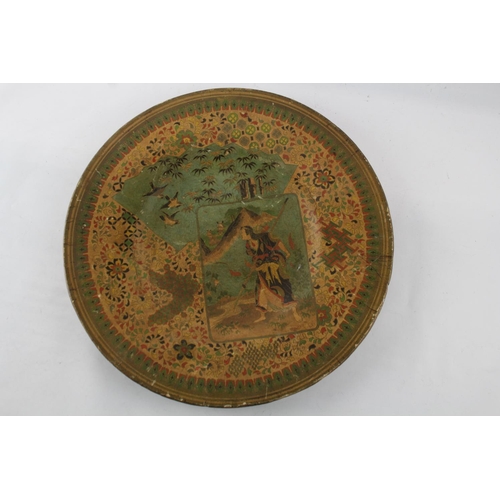 415 - An Oriental lacquered papier-mâché charger/dish