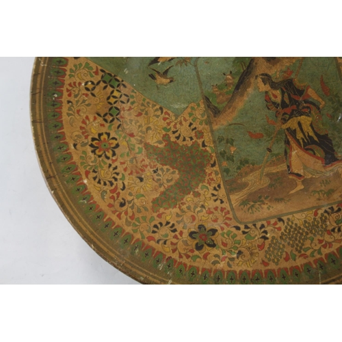 415 - An Oriental lacquered papier-mâché charger/dish