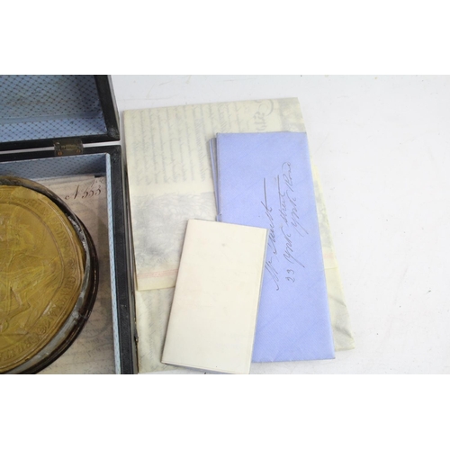 416 - A boxed Victorian patent certificate and large wax seal