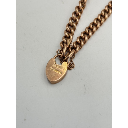 2126 - An Edwardian hallmarked Chester 9ct gold chain link bracelet with heart shaped padlock clasp, dated ... 