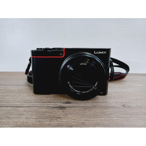 13 - A cased Panasonic Lumix DMC-TZ100 21mp CMOS sensor compact digital camera