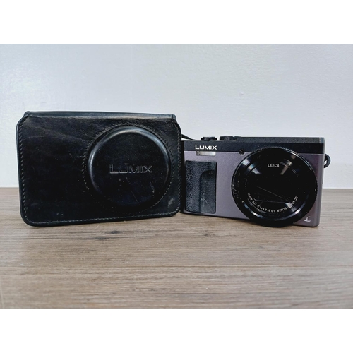 14 - A cased Panasonic Lumix DMC-TZ93 20.3mp high sensitivity MOS sensor compact digital camera