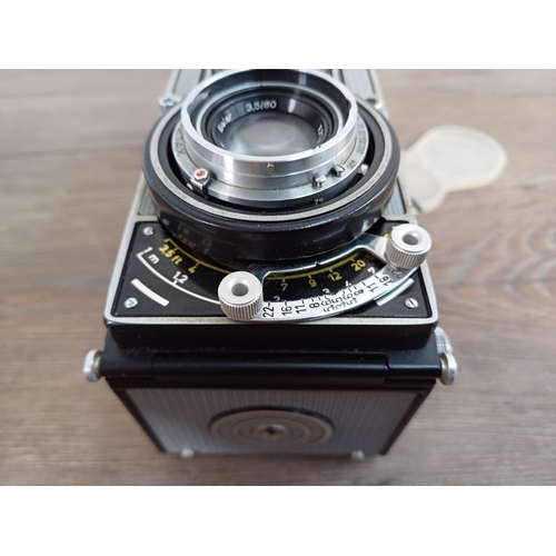 17 - A cased Meopta Flexaret VI (late version, grey skin) TLR camera for 120 film fitted with Belar 3.5/8... 