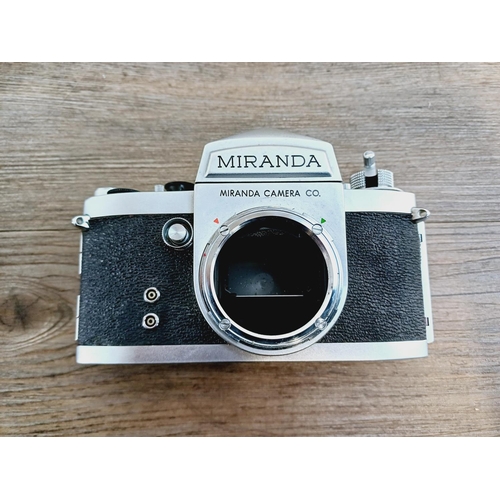 2 - A boxed and cased 1960s Miranda Camera Co. Miranda DR 1.9 (serial no. 667631) interchangeable viewfi... 