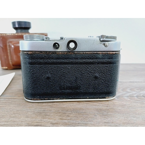 4 - A cased 1950s Wirgin Bros. Edixa II 35mm rangefinder camera fitted with Isco Isconar 1:2.8/43mm lens... 