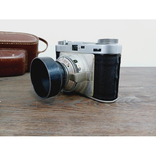 4 - A cased 1950s Wirgin Bros. Edixa II 35mm rangefinder camera fitted with Isco Isconar 1:2.8/43mm lens... 