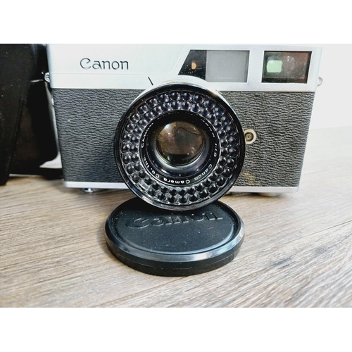 9 - Two items, one cased 1960s Canon Canonet automatic-exposure 35mm rangefinder camera fitted with 1:1.... 