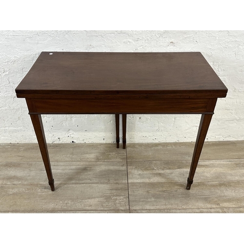 177 - A Georgian mahogany fold over tea table - approx. 71cm high x 93cm wide x 93cm deep