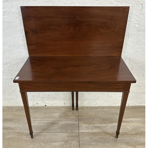 177 - A Georgian mahogany fold over tea table - approx. 71cm high x 93cm wide x 93cm deep