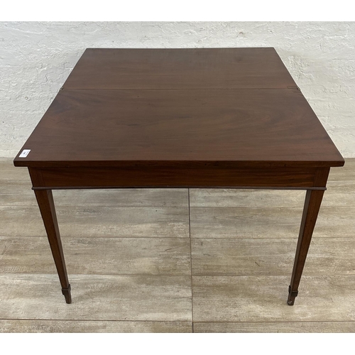 177 - A Georgian mahogany fold over tea table - approx. 71cm high x 93cm wide x 93cm deep