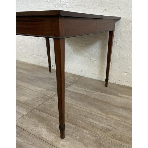 177 - A Georgian mahogany fold over tea table - approx. 71cm high x 93cm wide x 93cm deep