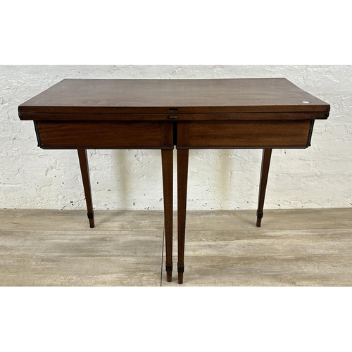 177 - A Georgian mahogany fold over tea table - approx. 71cm high x 93cm wide x 93cm deep