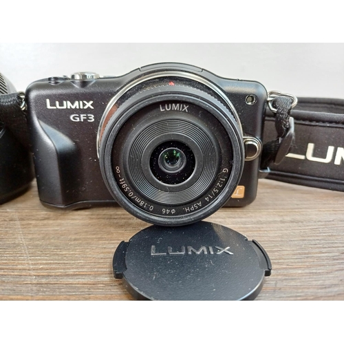 18 - A Panasonic Lumix DMC-GF3 Micro Four Thirds 12mp mirrorless digital system camera fitted with G 1:2.... 