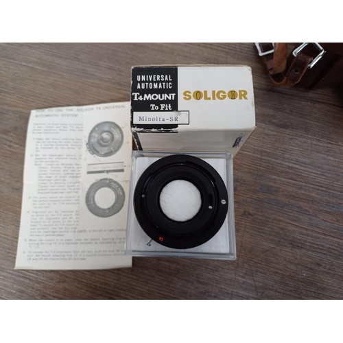 26 - A cased late 1950s/early 1960s Chiyoda Kogaku Minolta SR-1 (first version) 35mm SLR camera fitted wi... 