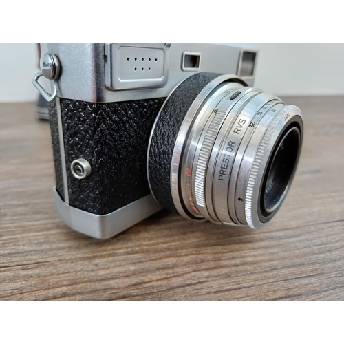 27 - A cased late 1950s Carl Zeiss Jena Werra 4 (flat top) interchangeable lens 35mm rangefinder camera f... 