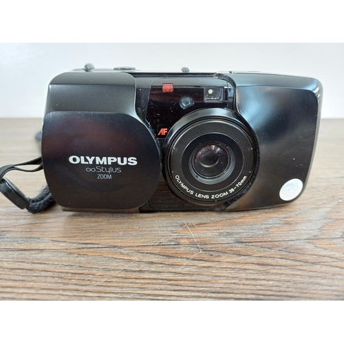 28 - An Olympus ∞ Stylus (µ[mju:]) Zoom weatherproof compact 35mm camera