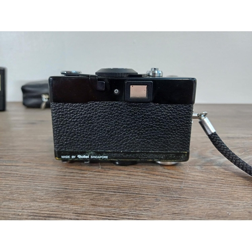 32 - Two Rollei items, one cased late 1970s 35 LED ultra-compact 35mm viewfinder camera fitted with Triot... 