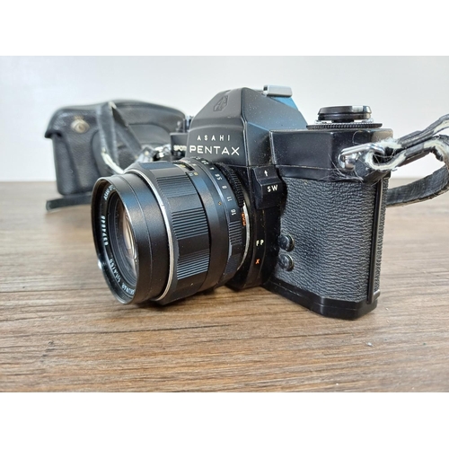 35 - A cased 1970s Asahi Pentax Spotmatic SPII 35mm SLR camera fitted with Super-Multi-Coated Takumar 1:1... 