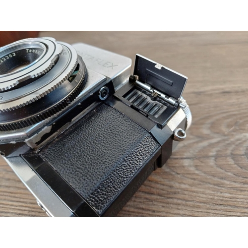 36 - A cased mid 1950s Zeiss Ikon Contaflex II 35mm SLR camera fitted with Tessar 1:2.8 45mm lens, Synchr... 