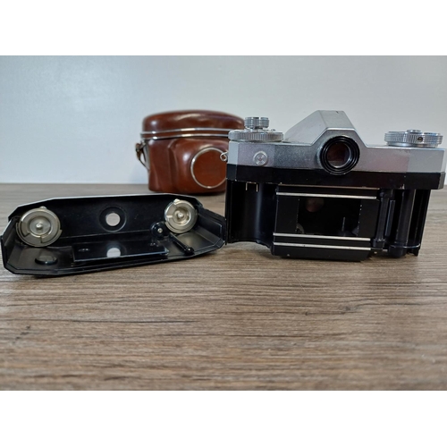 36 - A cased mid 1950s Zeiss Ikon Contaflex II 35mm SLR camera fitted with Tessar 1:2.8 45mm lens, Synchr... 