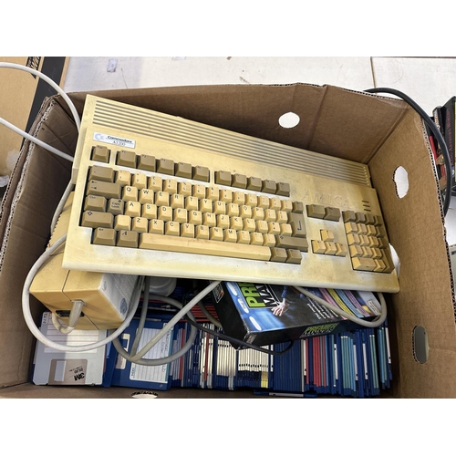 603 - A Commodore A1200 personal computer with a large collection of games and software together with a St... 