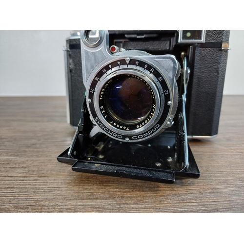 40 - A cased mid 20th century Zeiss Ikon Super Ikonta 532/16 folding rangefinder camera (serial no. A3323... 