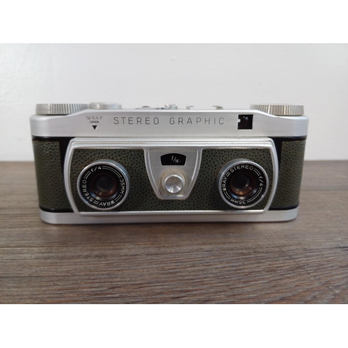 41 - A cased late 1950s Wray Stereo Graphic 35mm stereo camera fitted with Wray f/4 35mm lenses (original... 