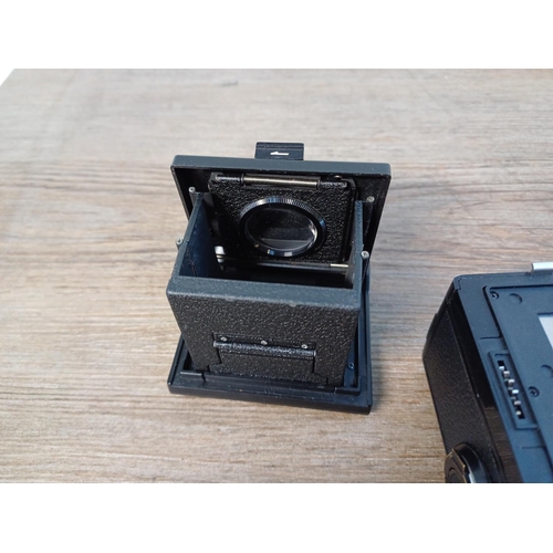 42 - Two Zenza Bronica items, one boxed ETR 120 filmback and one waist-level finder