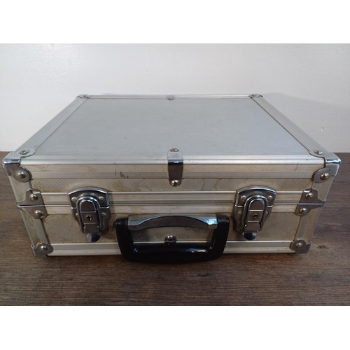 44 - An aluminium flight case containing Asahi Pentax ME 35mm SLR camera body fitted with ME II Winder, T... 