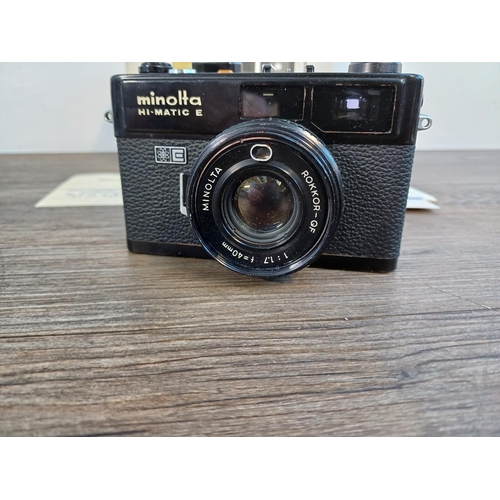 45 - A boxed 1970s Minolta Hi-Matic E 35mm rangefinder camera fitted with Rokkor-QF 1:1.7 f=40mm lens and... 